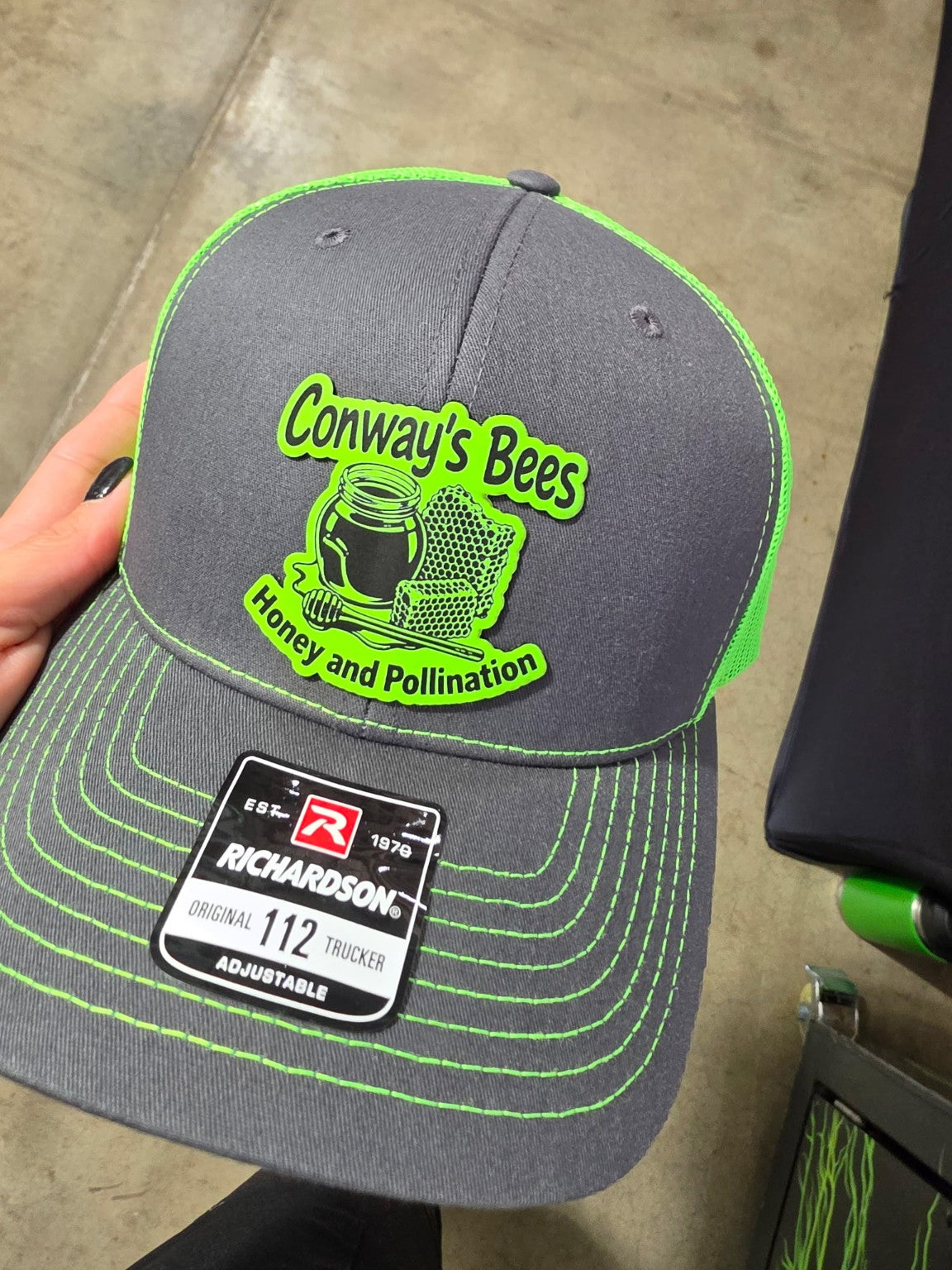 Custom leather patch trucker hat by MJS Solution LLC